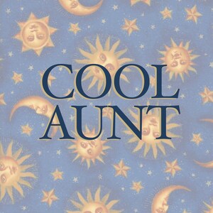 May include: A blue background with a repeating pattern of gold stars and moons. The text "COOL AUNT" is written in large, navy blue letters.