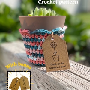 May include: Crochet pattern for a planter cozy with a pink, blue, and white color scheme. The pattern includes printable labels that say "Thank you for helping me grow!" and "A gift for you".