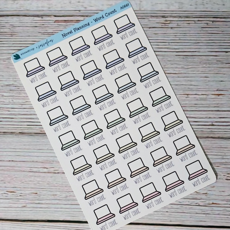 May include: A sheet of planner stickers featuring laptop icons in various pastel colors. Each laptop icon has the words "word count" printed below it. The stickers are labeled "Novel Planning - Word Count" and "snowdrop + sassafras". Laptop screen is left blank so that word count can be entered.