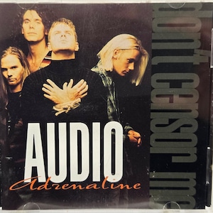 May include: A music CD case featuring the album cover for Audio Adrenaline's Don't Censor Me. The cover displays four band members in a dark, moody portrait. The text AUDIO Adrenaline is printed in white and orange, with Don't Censor Me vertically.