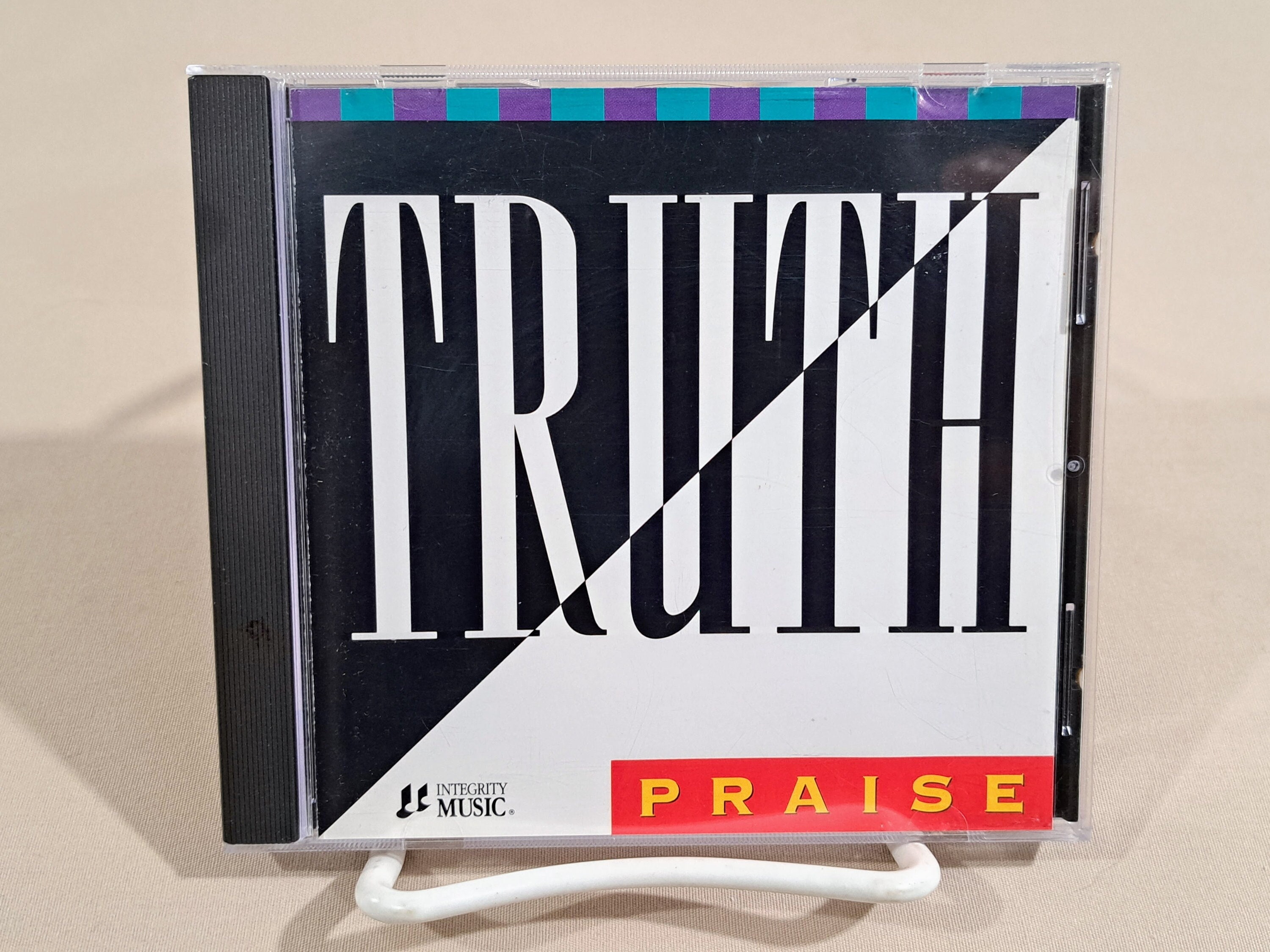 Vintage 90's Praise & Worship Music CD, "Praise" from Truth featuring Jody McBrayer and Alicia Williamson, Integrity Music, 1992.