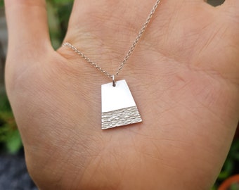 Handmade Silver Engraved Horizon necklace.