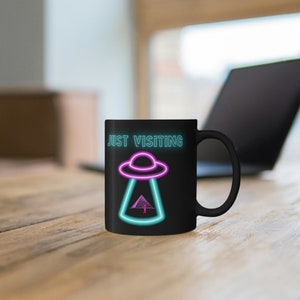 Just Visiting Neon UFO with Alien at the Pyramids  11oz Black Mug