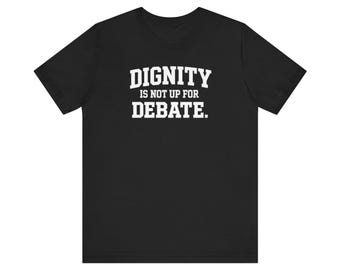 Camiseta unisex con texto "La dignidad no se debate"