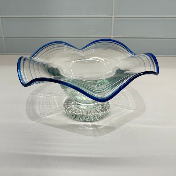 Console Bowl-Art Glass Clear Bowl with Blue Rim and pedestal base - elegant wave ruffle to the rim -No disclosures- 8" diameter x 3.25" tall