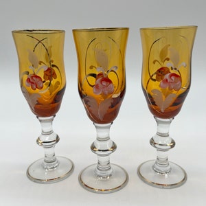 3 Vintage Bohemian Style Amber Glass Goblets Clear Stems & Hand Painted Enamel Flowers and Gold Gilt Accents. A bit of wear on paint/gold.