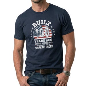 May include: A set of three ceramic mugs with a speckled, matte finish. The mugs are in shades of cream, light gray, and dark gray. Each mug has a simple, minimalist design and a rounded handle.