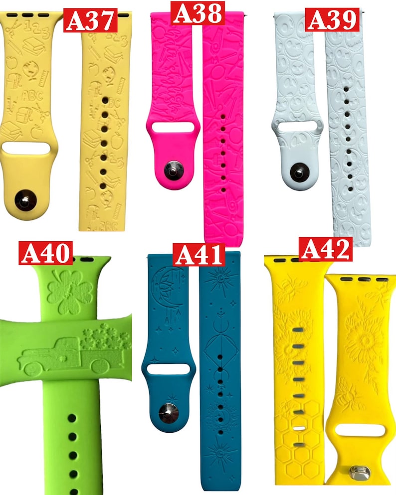 May include: A collection of colorful watch bands. The bands are yellow, hot pink, white, light green, and teal. Each band features a unique embossed design, including school supplies, smiley faces, a truck with shamrocks, celestial patterns, and a honeycomb.