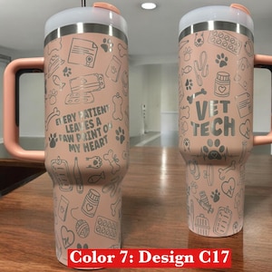 May include: Two pink stainless steel tumblers with a white design. One tumbler has the text "Every patient leaves a paw print on my heart" and the other has the text "Vet Tech".