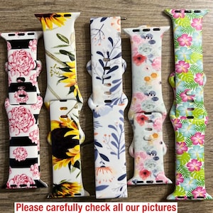 May include: Five different patterned watch bands. The bands are made of silicone and have a variety of floral and geometric designs. The bands are all in bright colors, including pink, yellow, green, blue, and white.