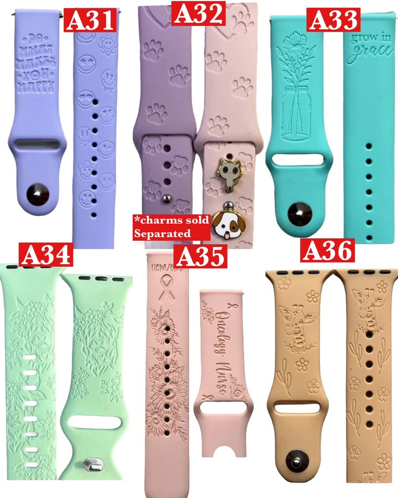 May include: A collection of colorful watch bands. Designs include smiley faces, paw prints, floral patterns, and text that reads "grow in grace" and "Oncology Nurse." Some bands have decorative charms. The bands are in various colors, including lavender, pink, and teal.