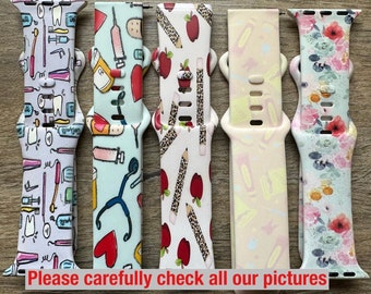 May include: Five different Apple Watch bands with various colorful patterns. The bands are made of silicone and feature designs such as dental tools, apples, pencils, and floral patterns.