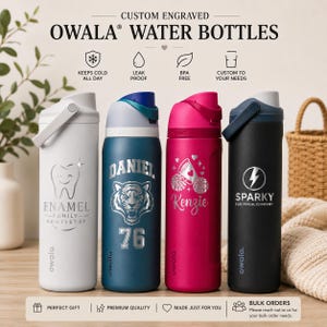 May include: Four Owala water bottles with custom engravings. From left to right: a white bottle with a tooth logo, a blue bottle with a tiger and the name Daniel, a pink bottle with pom-poms and the name Kenzie, and a black bottle with a lightning bolt logo.