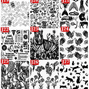 May include: A grid of nine distinct black and white patterned sheets labeled J19 through J27. Designs include pickles, veterinary icons, anatomical skeletons, animal rescue quotes, a tiger, chickens, elephants, hummingbirds, and cat silhouettes.