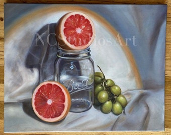 May include: A still life painting of a glass jar with a red grapefruit on top, a second grapefruit half on the table, and a bunch of green grapes. The jar is labeled "Ball Mason".