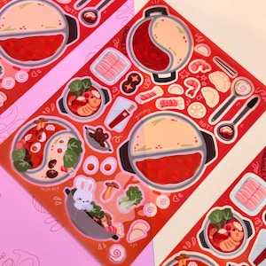 May include: A set of colorful stickers featuring a hot pot with various ingredients, including vegetables, meat, and noodles. The stickers are designed with a cartoon style and include text like "HOT!" and "yummy!"