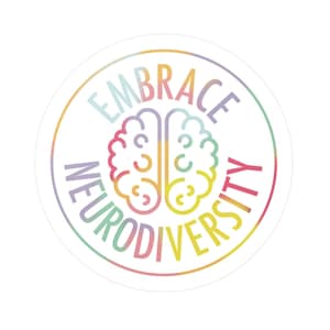 May include: A white circle sticker with a rainbow colored outline. The text "EMBRACE NEURODIVERSITY" is written in a circle around a stylized outline of a brain.