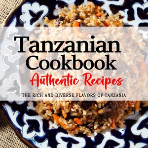 May include: A close-up of a plate of Tanzanian rice dish with carrots and dark meat. The plate has a blue and white floral design. The text "Tanzanian Cookbook Authentic Recipes THE RICH AND DIVERSE FLAVORS OF TANZANIA FATMA S. NGOWI" is on the image.