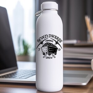 May include: White water bottle featuring a black and white graphic of a mining cart and crossed pickaxes. The graphic reads "Seven Dwarves Mining Crew".