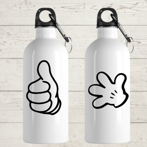May include: Two white water bottles with black accents. One bottle features a black thumbs-up graphic, and the other has a black cartoon hand graphic. Each bottle has a black carabiner clip attached to the top.