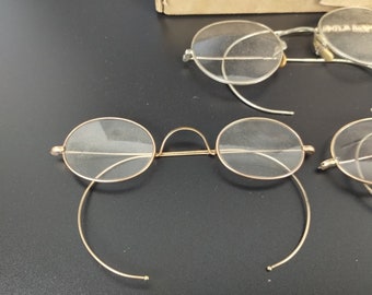 THREE pairs of anique glasses...comes with original box!!!
