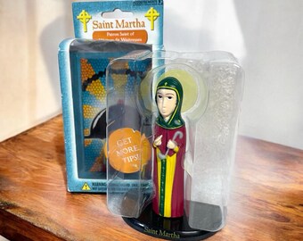 Statuetta religiosa cattolica di Santa Marta, patrona dei camerieri e delle cameriere