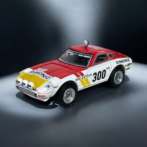 1973 BRE DATSUN Baja Z Tokyo Torque Diecast Model Car 1/64