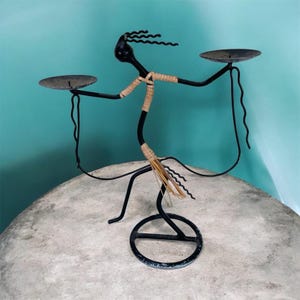 May include: A set of three ceramic mugs with a speckled, matte finish. The mugs are in shades of cream, light gray, and dark gray. Each mug has a simple, minimalist design, perfect for coffee or tea.