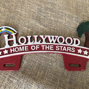 License Plate fobs 1940s Hollywood Home of the Stars