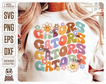 May include: A white sweatshirt with a colorful graphic design that says "GATORS" in a retro font. The graphic is surrounded by flowers and small panda bear logos.