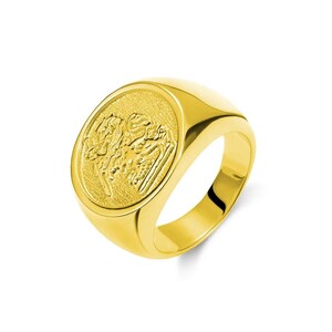 May include: A gold signet ring with a detailed design of a lion's head on the face of the ring.