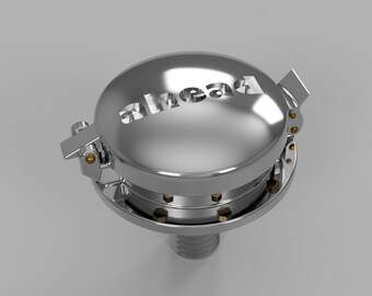 May include: A silver metal bottle stopper with a hinged lid and the word "ahead" cut out of the top. The stopper has a threaded base.