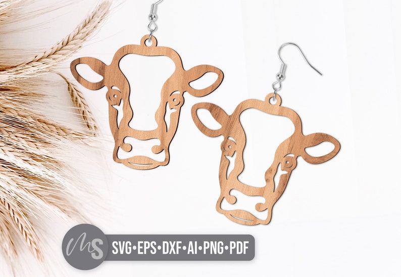 SVG Laser Cut Files for a pair of Cow Earrings. A cute cow head earring template perfect for making wood and acrylic farm animal and country earrings!