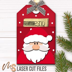 SVG Laser Cut Files for a bundle of 6 Christmas Gift Card Holders featuring cute Gift Tag shapes decorated with a Santa Claus, the text Ho Ho Ho, a Snowman, a Gingerbread Man, a Reindeer, and a Christmas Coffee Cup with spacers on the inside where you can insert your Gift Cards and money! Create festive Gift Card Holders, Money Holders, and gift Ornaments!