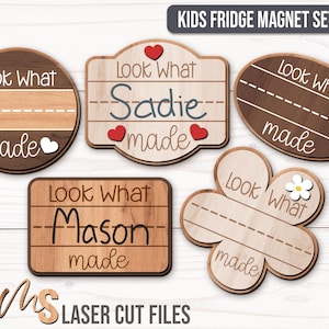 An SVG Bundle of Custom Fridge Magnets for Kids in different shapes including badge shapes and a flower shaped magnet each with a space for custom names and the phrase Look What I Made in fun fonts. The perfect Kids Craft Kit for making Custom Fridge Magnets and Kitchen Decor including Baby Keepsakes and Gifts for Mom!
