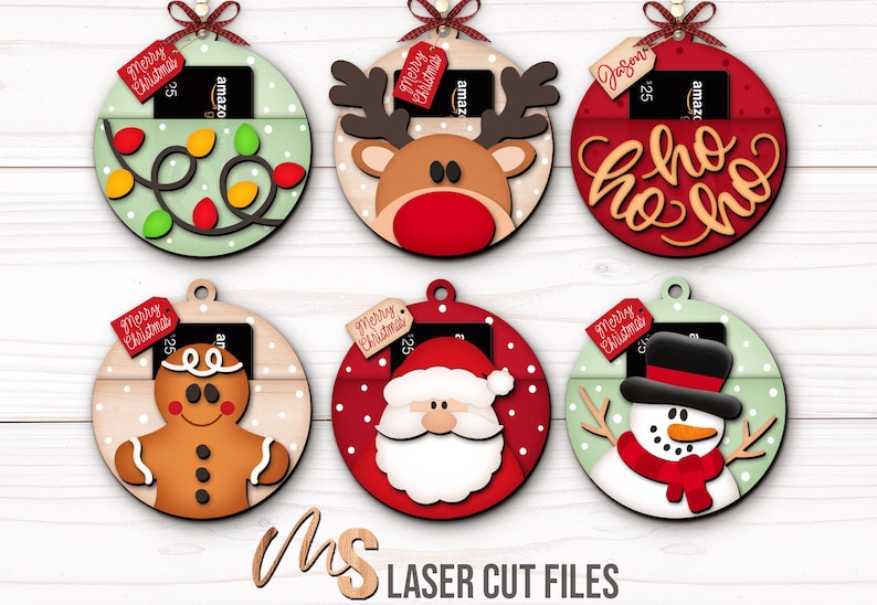 SVG Laser Cut Files for a bundle of 6 Christmas Gift Card Holders shaped like ornaments decorated with a Santa Claus, the text Ho Ho Ho, a Snowman, a Gingerbread Man, a Reindeer, and a string of Christmas lights with spacers on the inside where you can insert your Gift Cards and money, and an additional tag which says Merry Christmas or add your own custom name for personalization! Create festive Gift Card Holders, Money Holders, and gift Ornaments!