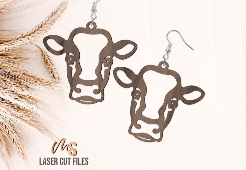 SVG Laser Cut Files for a pair of Cow Earrings. A cute cow head earring template perfect for making wood and acrylic farm animal and country earrings!