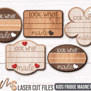 An SVG Bundle of Custom Fridge Magnets for Kids in different shapes including badge shapes and a flower shaped magnet each with a space for custom names and the phrase Look What I Made in fun fonts. The perfect Kids Craft Kit for making Custom Fridge Magnets and Kitchen Decor including Baby Keepsakes and Gifts for Mom!
