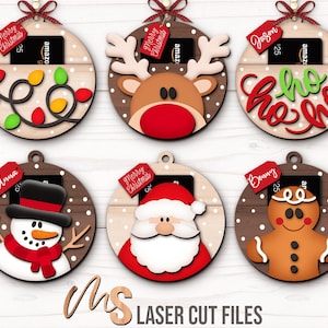 SVG Laser Cut Files for a bundle of 6 Christmas Gift Card Holders shaped like ornaments decorated with a Santa Claus, the text Ho Ho Ho, a Snowman, a Gingerbread Man, a Reindeer, and a string of Christmas lights with spacers on the inside where you can insert your Gift Cards and money, and an additional tag which says Merry Christmas or add your own custom name for personalization! Create festive Gift Card Holders, Money Holders, and gift Ornaments!