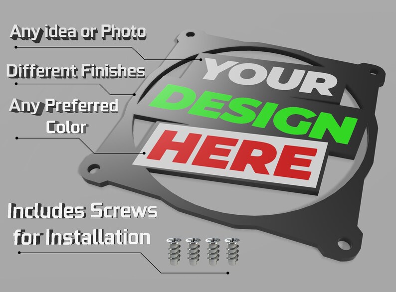 May include: A black metal fan grill with the text "YOUR DESIGN HERE" in white, green, and red. The grill includes screws for installation.