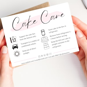 May include: A white card with black text and icons outlining how to care for a cake. The text includes instructions for transporting, storing, and serving the cake. The card also includes contact information for the bakery.