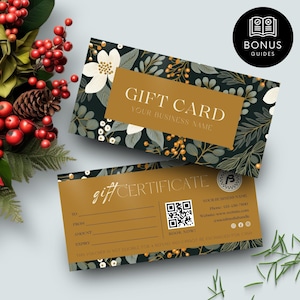 以下が含まれることがあります： 濃い緑、金、白の花柄のデザインのギフトカードとギフト券。「Gift Card」と「Your Business Name」と書かれたギフトカード。ギフト券には「To」、「From」、「Amount」、「Expiry」のフィールドが含まれています。