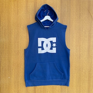 May include: A sleeveless blue hooded sweatshirt with a white DC logo and a white star.