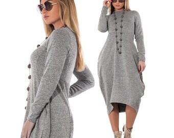 Stylish sweat dress with long sleeves and side pockets, leisure dress in large sizes, loose knit dress