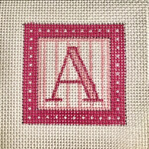 May include: A hand-stitched needlepoint canvas featuring the letter "A" in a pink and white color scheme. The letter is centered within a square frame, with a dotted border. The background is a neutral, off-white color.