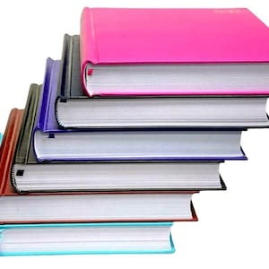 May include: A stack of six books with different coloured covers. The top book is pink, the next is black, then dark blue, light blue, brown, and finally a light blue book on the bottom.