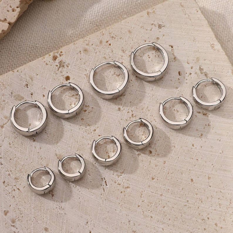 small huggie hoop earrings huggie hoop earrings sterling silver gold-plated sterling silver small thick conical hoop earrings Silber