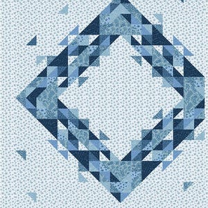 May include: A blue and white geometric pattern quilt with a diamond shape in the center. The diamond is made up of smaller triangles in shades of blue. The background is a light blue with a white star pattern.