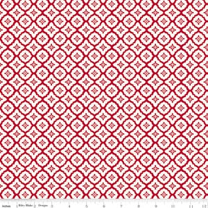 May include: Red and white patterned fabric with a repeating floral design. The pattern features a series of red floral shapes set against a white background. The fabric has a ruler at the bottom with the text "Riley Blake Designs".