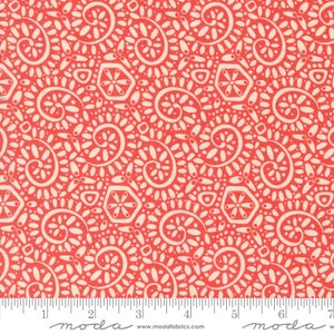 May include: Red fabric with a white pattern of swirls, dots, and geometric shapes. The fabric is printed with the text "moda" and a website address.